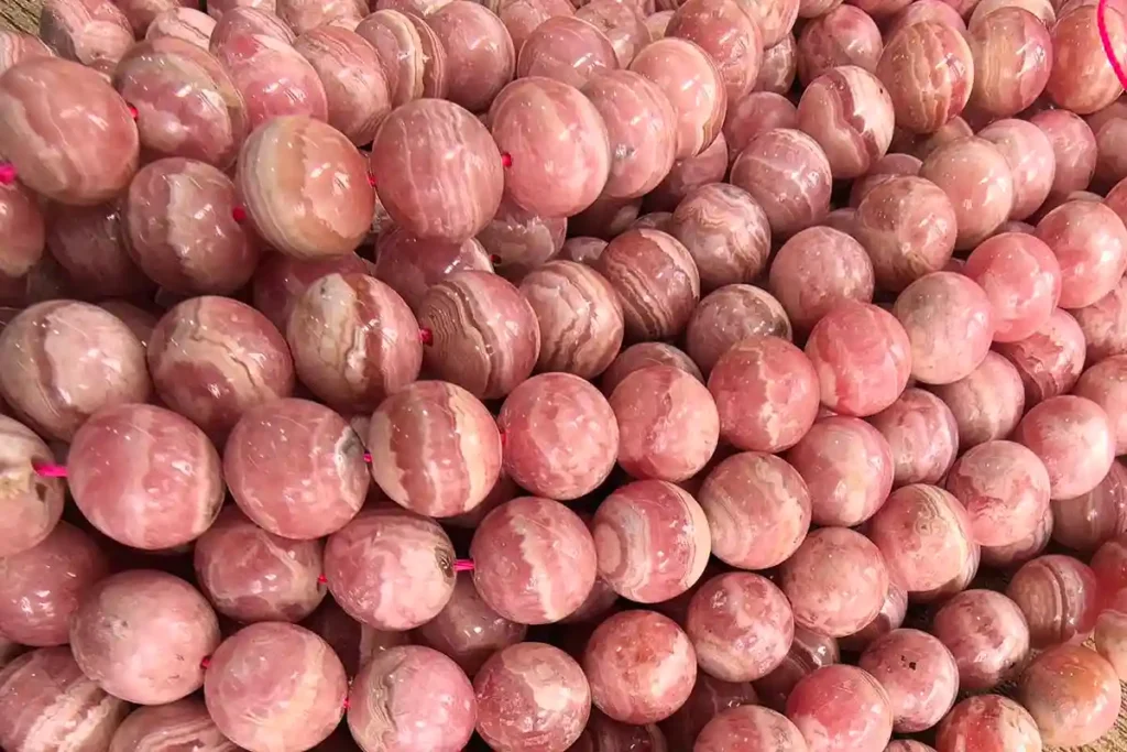 8mm rhodochrosite strand beads in rhodonite vs rhodochrosite comparison