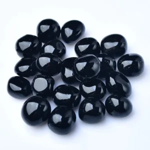 Natural Black Obsidian Tumbled Stone Wholesale arranged for bulk display