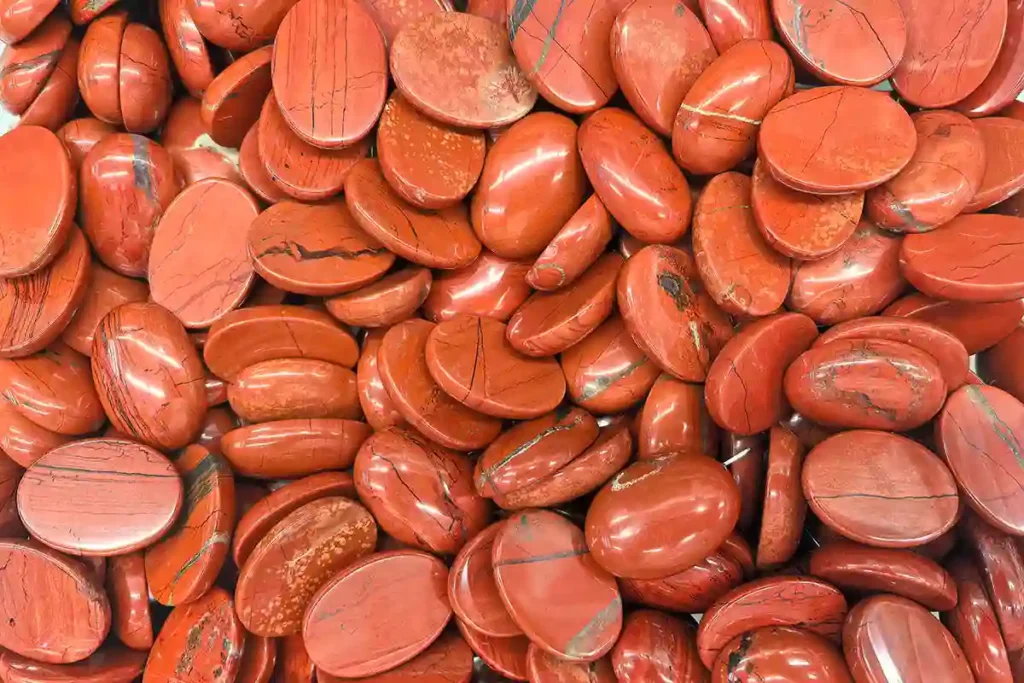 Red Jasper Meaning cabochon natural red stone close-up for jewelry making