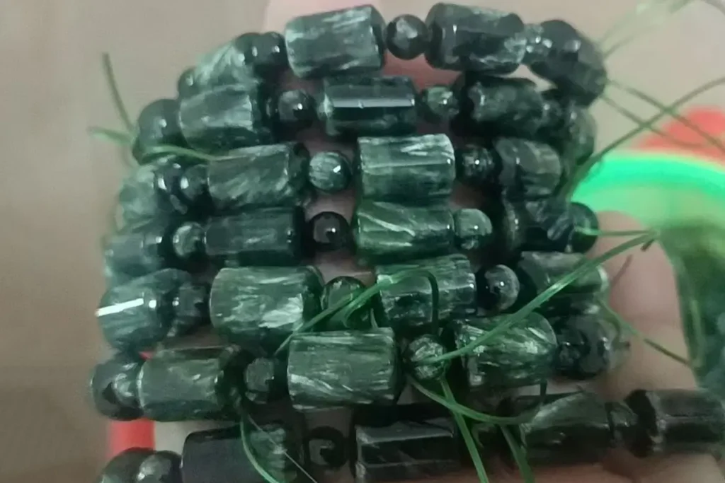 Seraphinite Bracelet polished green seraphinite bead bracelet with silver feather-like patterns