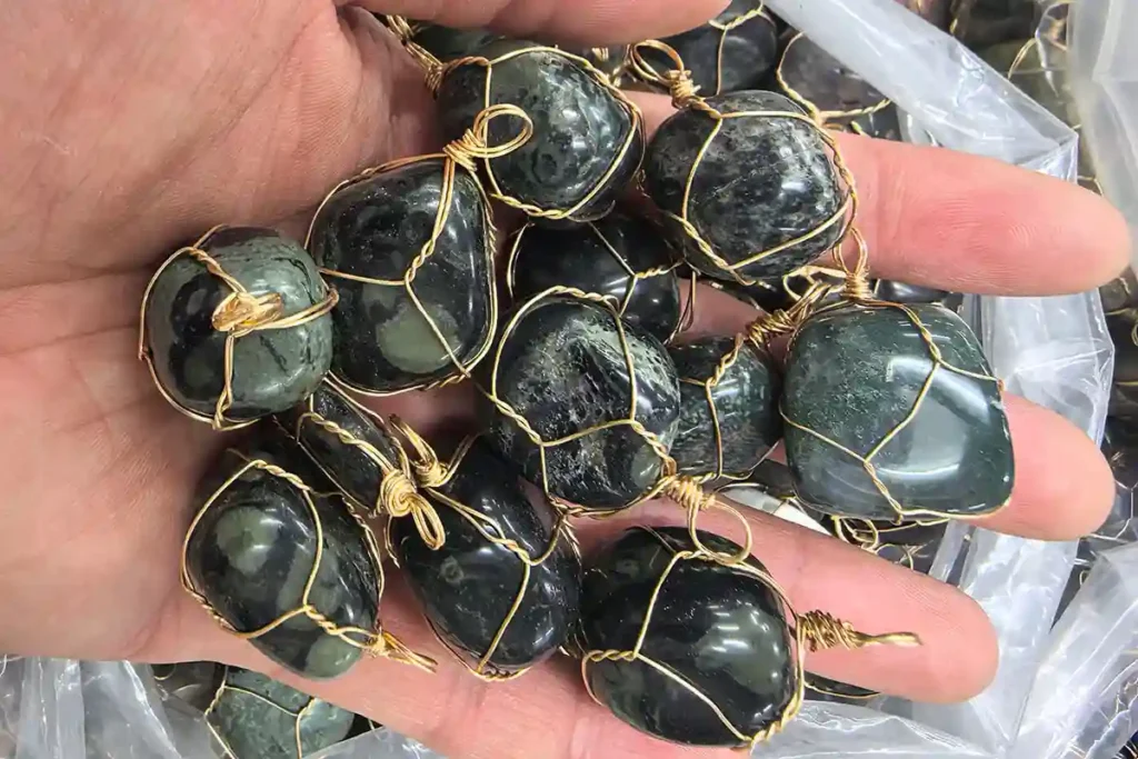 Wired Kambaba Jasper tumbled stone showing natural patterns linked to Kambaba Jasper Meaning