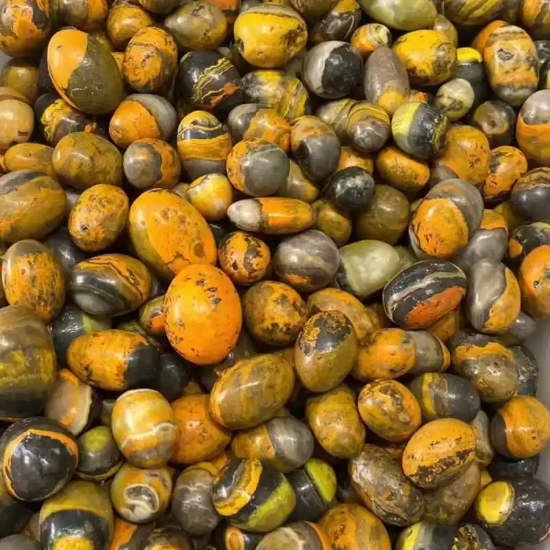 Polished Bumblebee Jasper tumbled stone with natural yellow gray and black pattern for Bumblebee Jasper Meaning