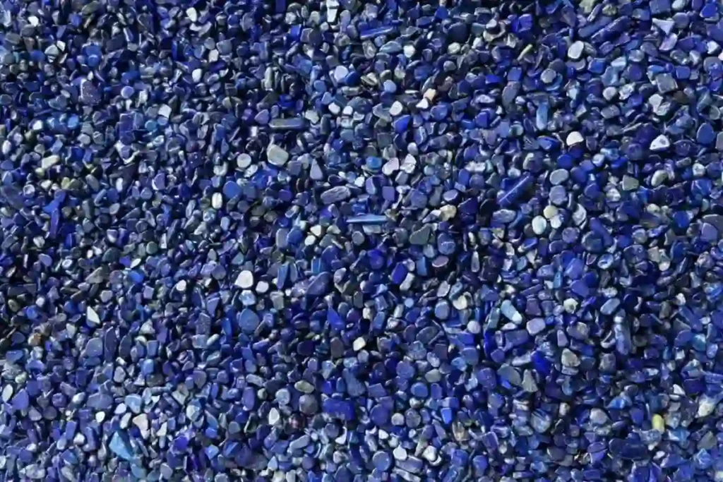 Wholesale aggregate gems showing what does lapis lazuli look like in raw polished chip stone format with natural pyrite specks.