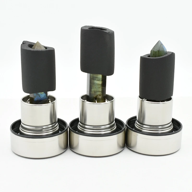 Secure rubber protection sleeves on mineral pillars for safe Labradorite Crystal Water Bottle Wholesale transit.
