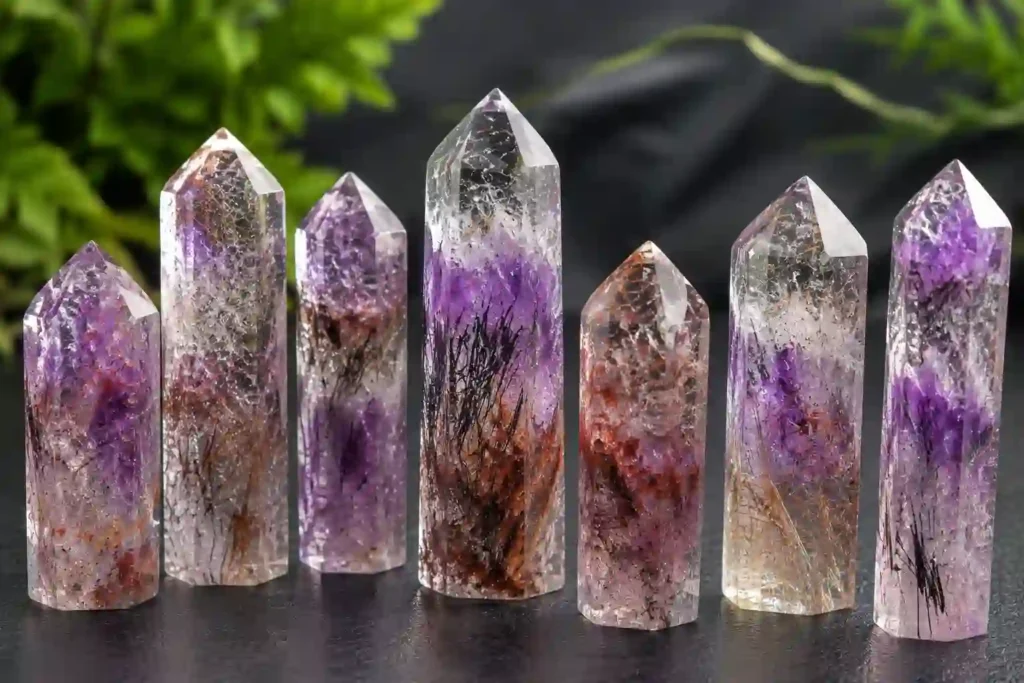 Super Seven Crystal meaning illustrated through polished crystal towers with visible inclusions and collector-grade patterns