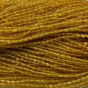 Close-up of Tube Genuine Amber Beads Wholesale with natural texture and golden amber tones