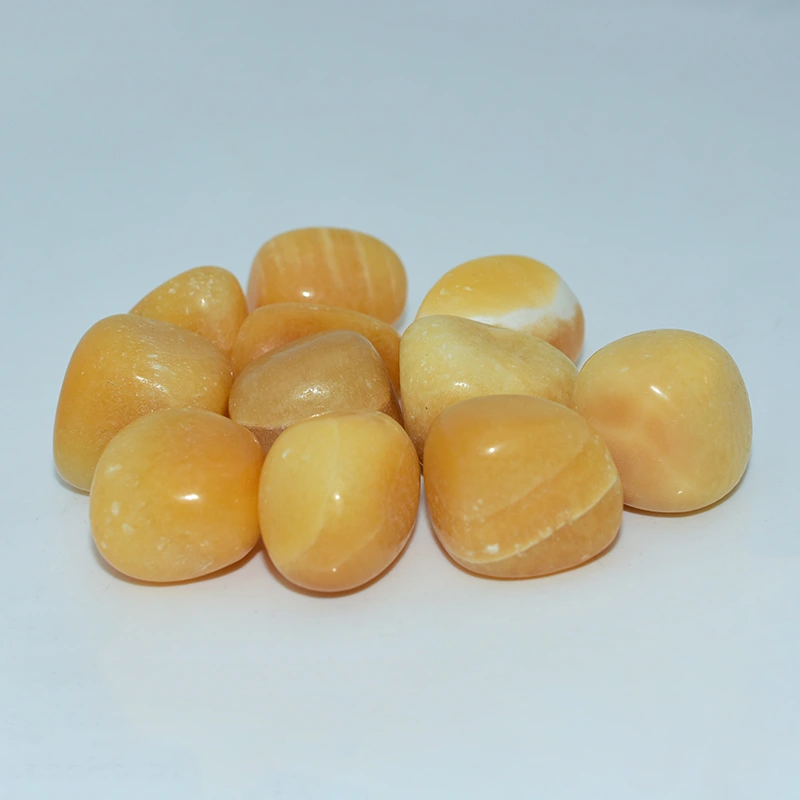 Yellow Calcite Tumbled Stone Wholesale bulk lot with smooth polished surface