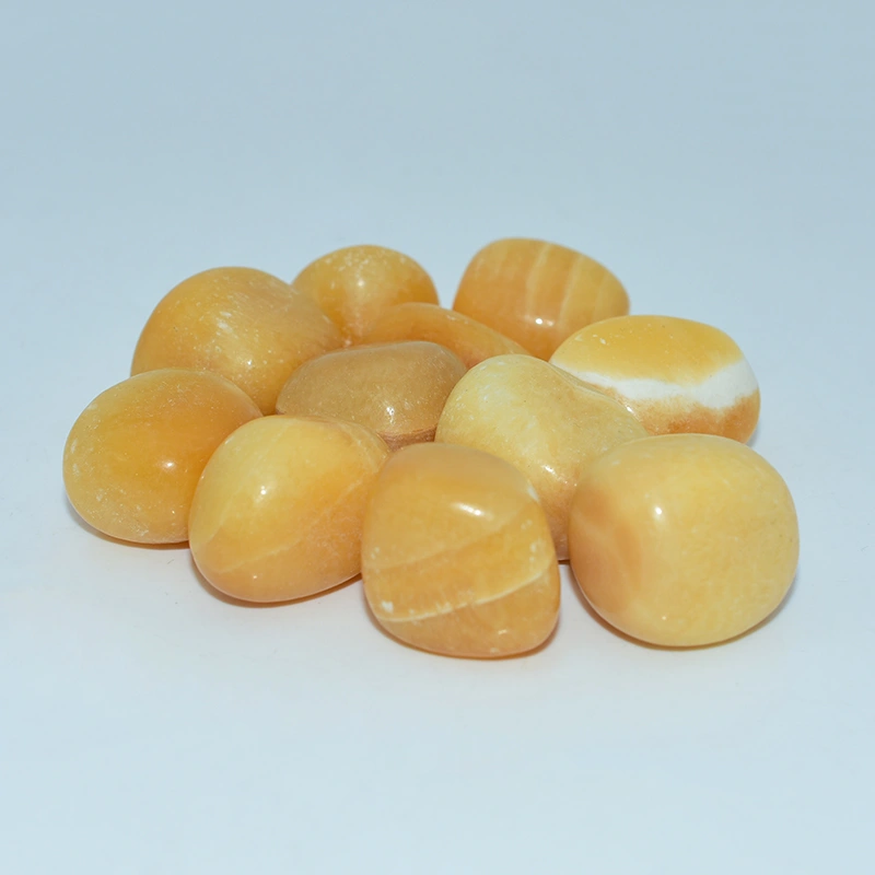 Yellow Calcite Tumbled Stone Wholesale polished stones for resale and gift shops