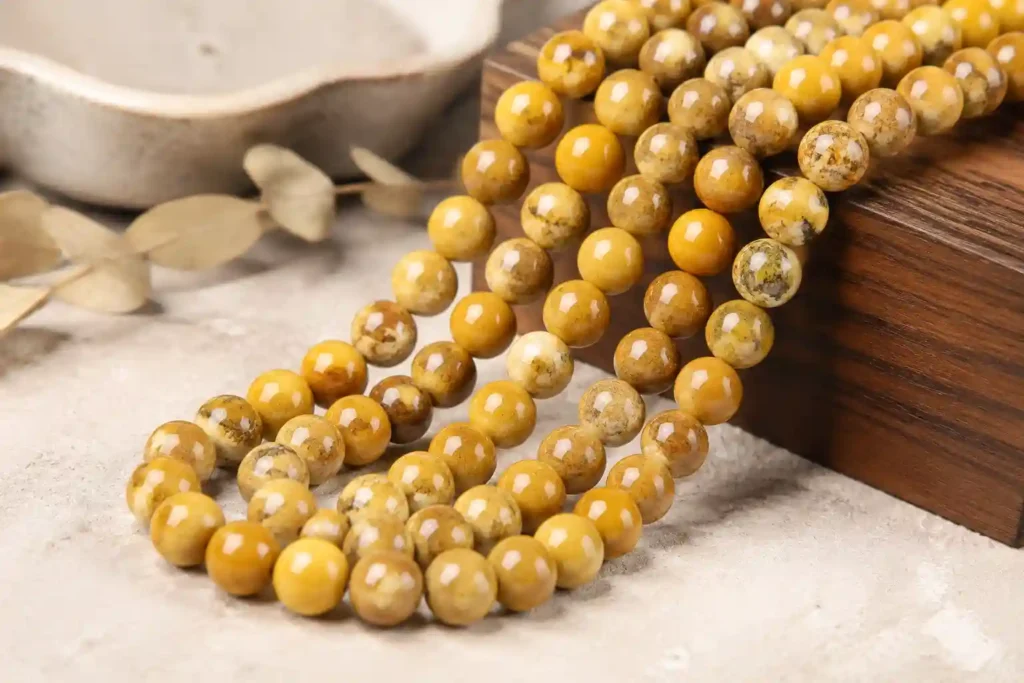 Yellow jasper meaning reflected in natural yellow jasper crystal bead strands for jewelry making and wholesale gemstone supplies