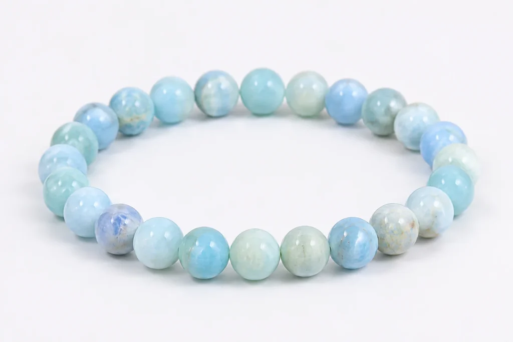 Blue opal bracelet with soft blue-green beads showing blue opal meaning for calm energy and peaceful daily wear