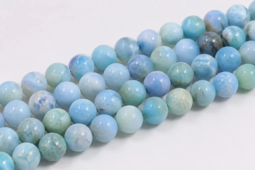 Blue opal string beads in soft blue and aqua tones for jewelry making and blue opal meaning designs