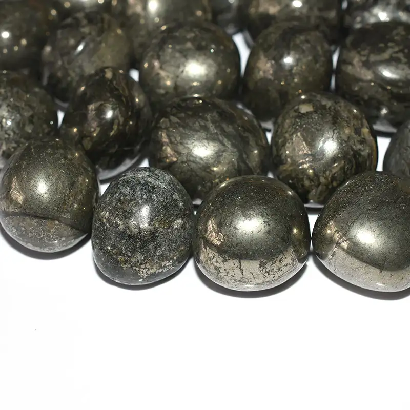 Bulk Pyrite Tumbled Stone Wholesale polished metallic crystal stones close-up