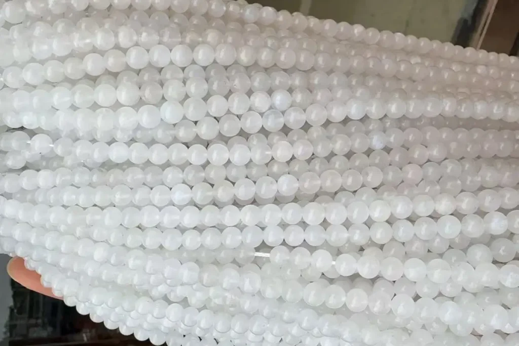 6mm white moonstone strand beads for bracelets and jewelry, showing Moonstone Benefits and natural color variation