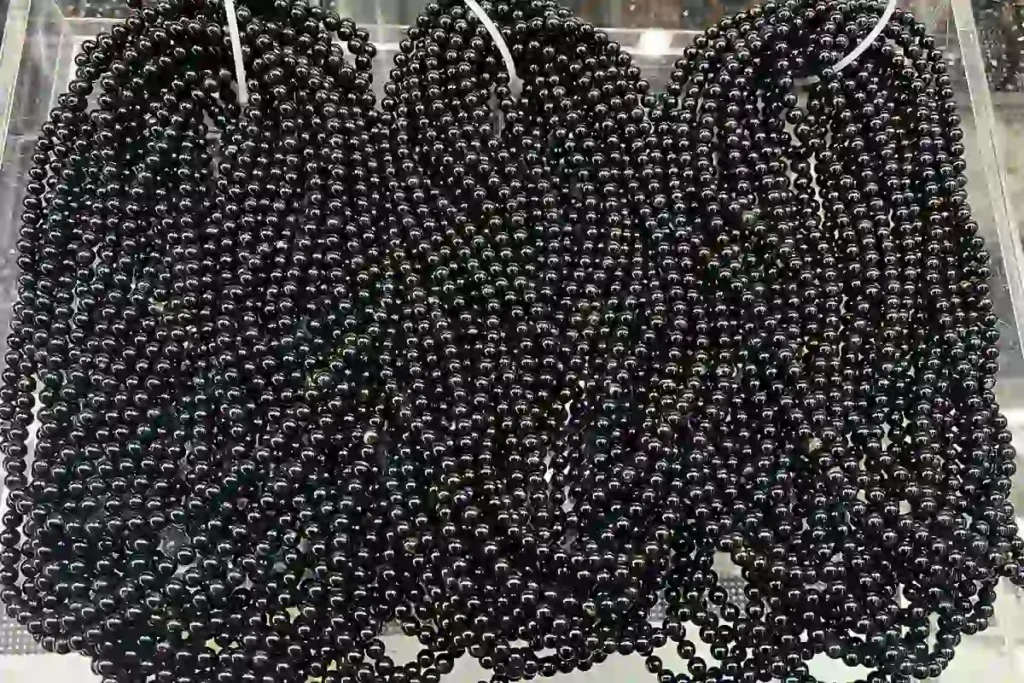 Black Tourmaline Meaning in prayer beads for grounding, meditation, and spiritual jewelry wholesale buyers