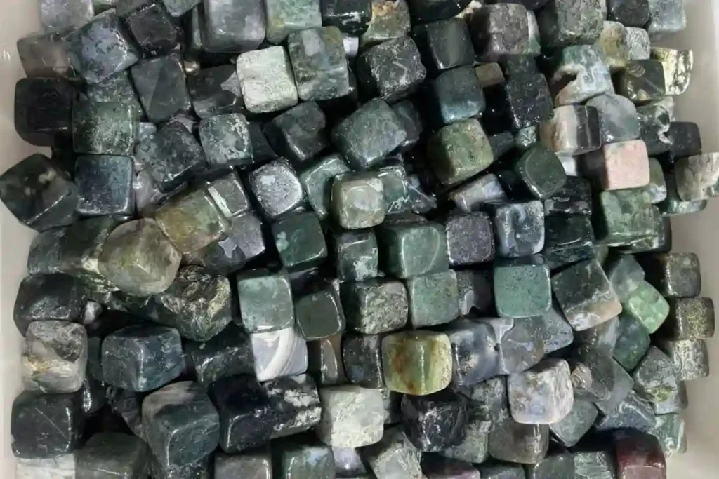 Moss Agate Meaning polished cube stones with natural green patterns