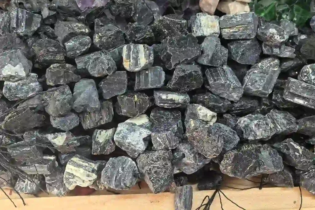 Raw black tourmaline strand beads showing Black Tourmaline Meaning for natural energy jewelry and bulk designs