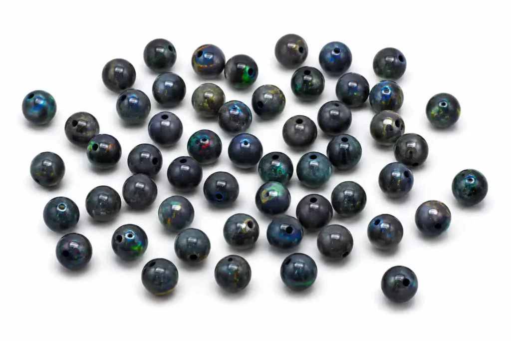 Black Opal Meaning loose round beads with colorful flashes