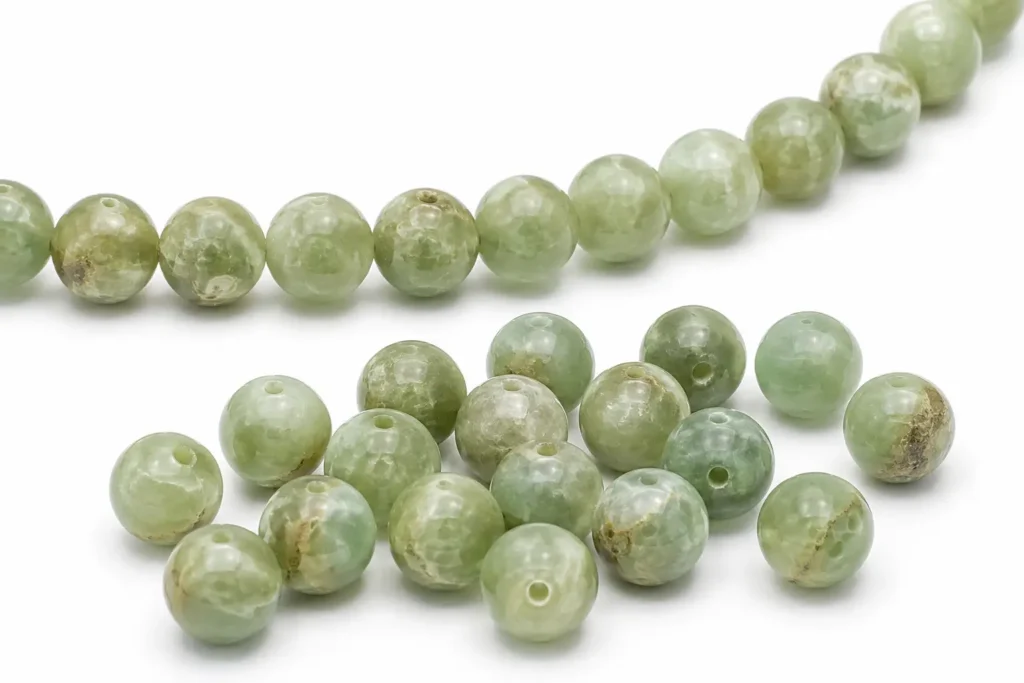 Green Opal Meaning – polished green opal crystal beads with natural soft green color and patterns