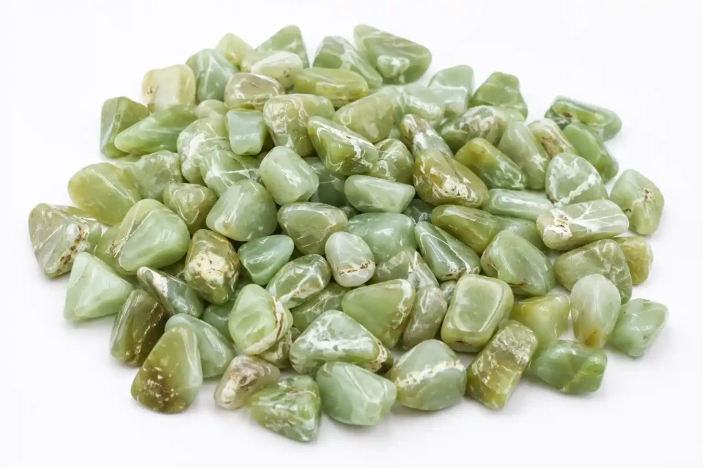 Green Opal Meaning – polished green opal tumbled stones with natural green shades and white patterns