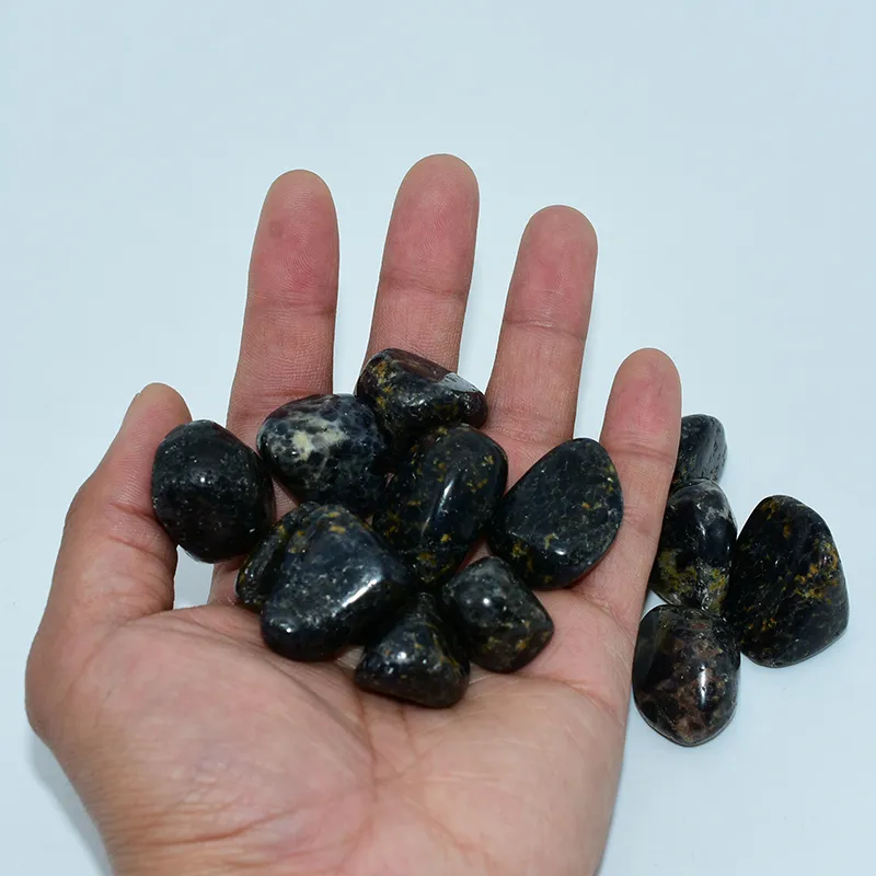 Iolite Tumbled Stones Wholesale showing natural size, color, and surface details by hand
