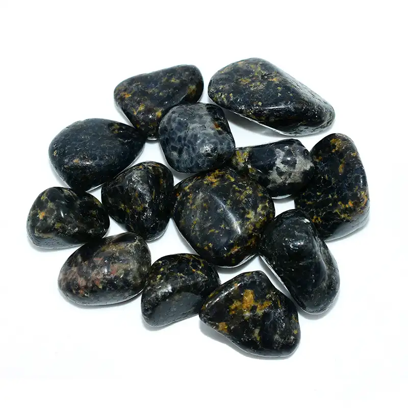 Top view of Iolite Tumbled Stones Wholesale with polished surfaces and natural variations