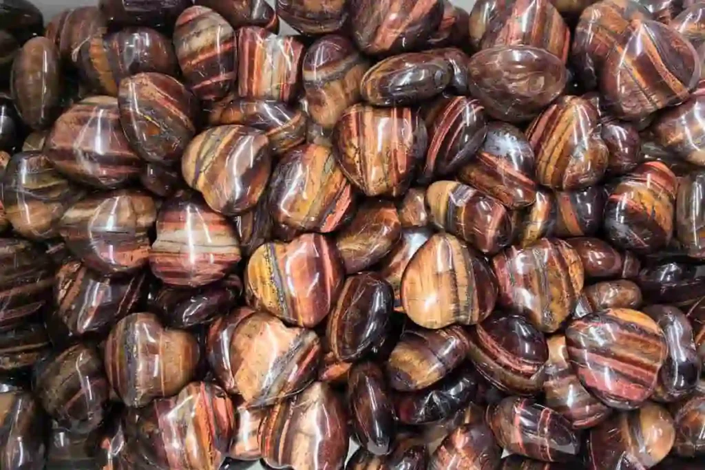 Polished heart-shaped stones for Red Tigers Eye Meaning and crystal gifts