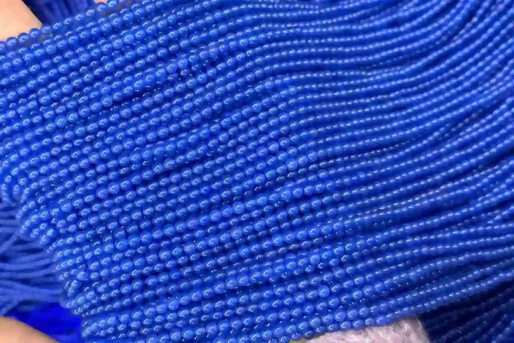 Blue Agate Meaning – close-up of 3 mm blue agate crystal beads