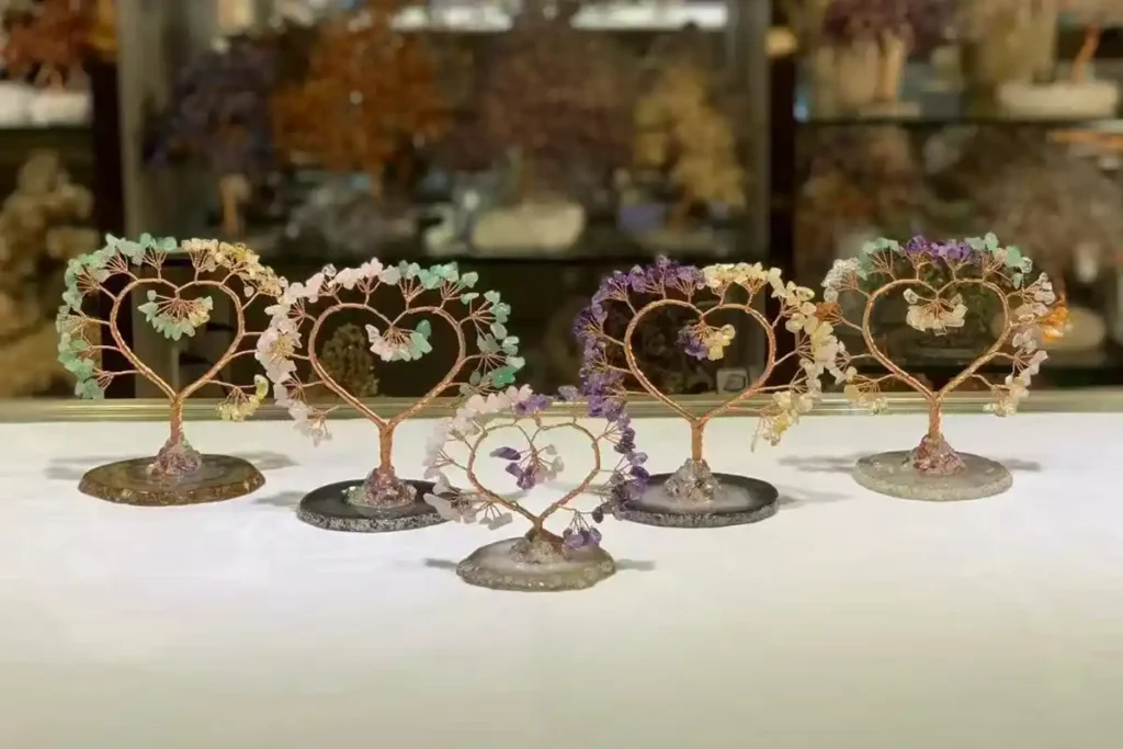 Agate Meaning shown with decorative crystal trees on agate bases