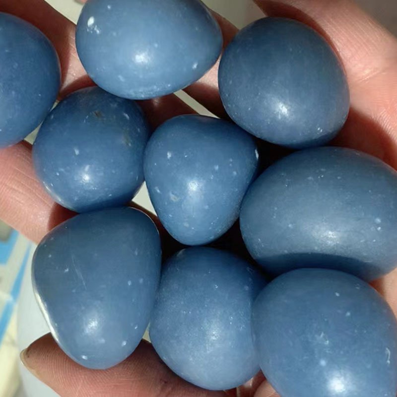 Angelite Stone Meaning with smooth polished blue Angelite tumbled stones for meditation, gifts, and crystal collections.