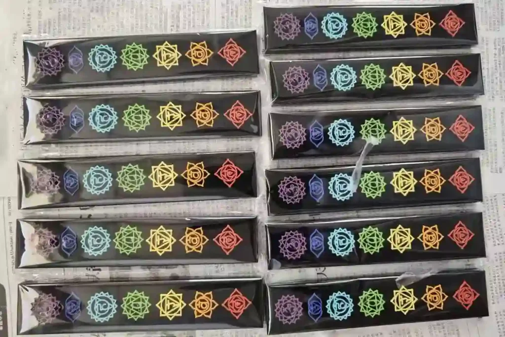 Black Obsidian vs Black Tourmaline guide showing boxed black obsidian chakra stone sets