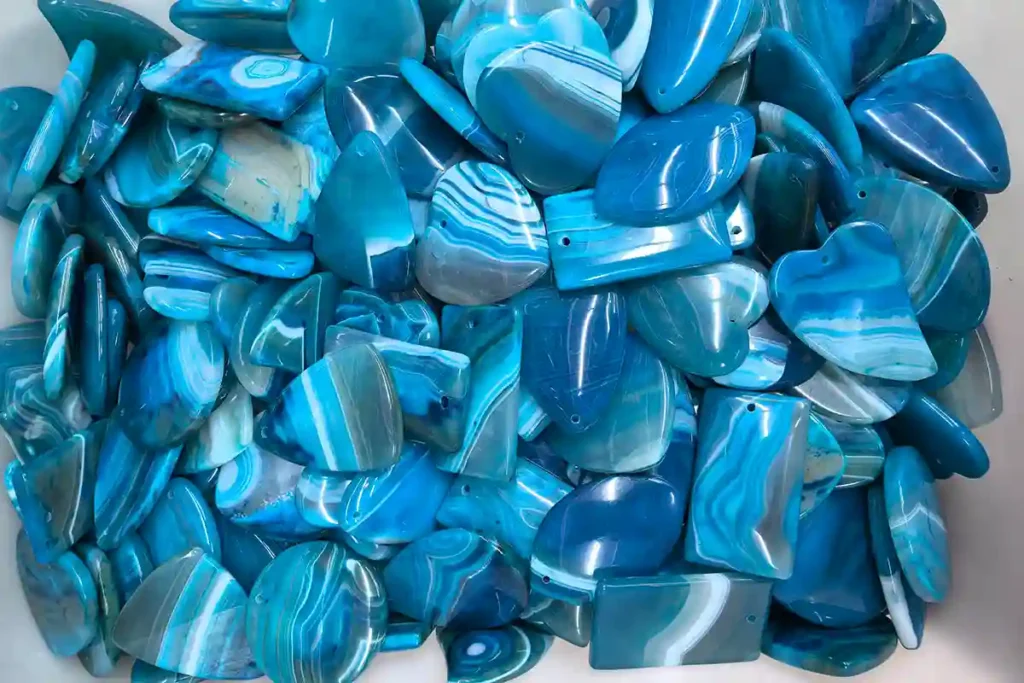 Blue Agate Meaning – blue agate pendants in assorted shapes