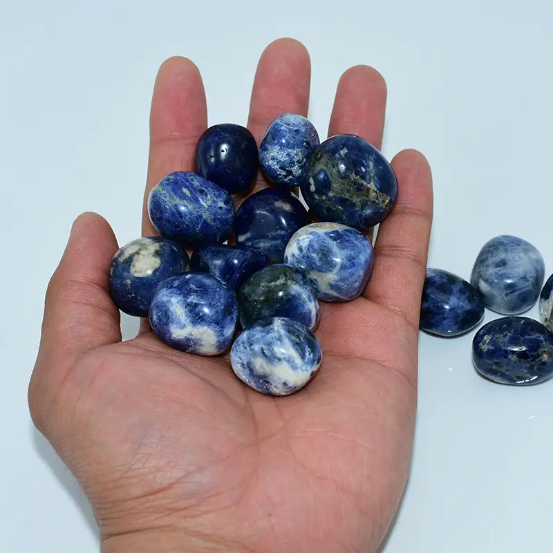 Sodalite Tumbled Stone Wholesale displayed in hand