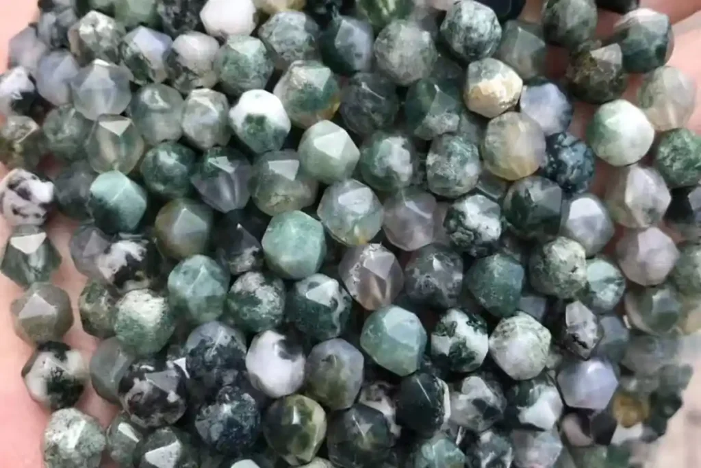 Tree Agate Meaning shown in diamond-cut beads with green and white natural patterns
