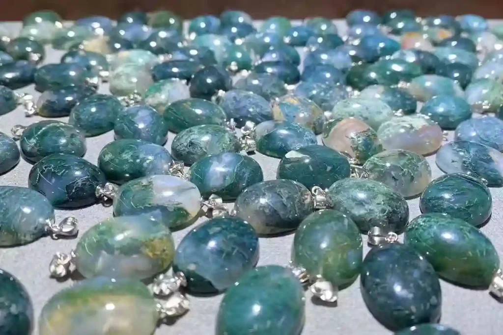 Agate Meaning with polished green Moss Agate pendants