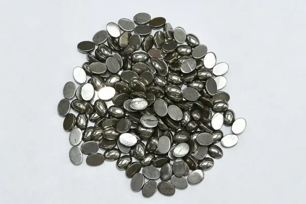 Pyrite Stone Benefits cabochon gemstones with natural metallic golden luster
