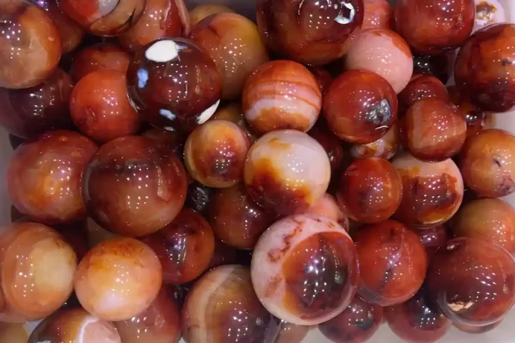 Red Agate Meaning – polished red agate crystal spheres