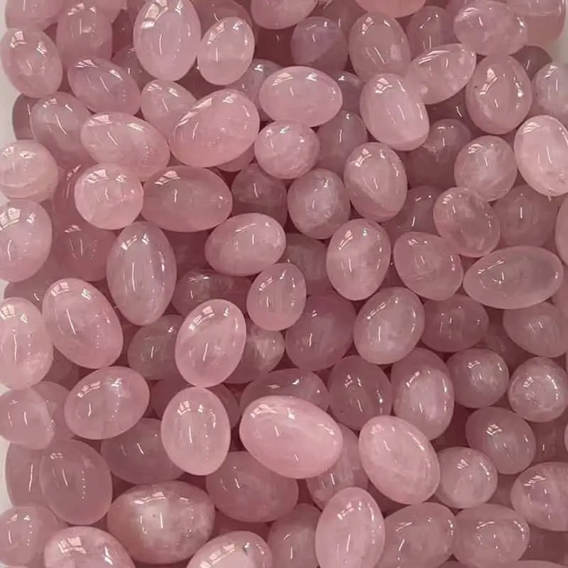 Pink quartz tumbled stones 2–3 cm illustrating Pink Quartz Meaning