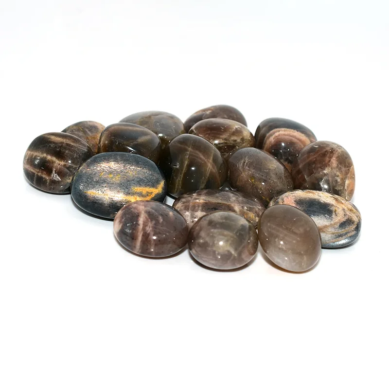 Black Sunstone Tumbled Stone Wholesale – polished 20–30mm stones with gray and brown tones on a white background