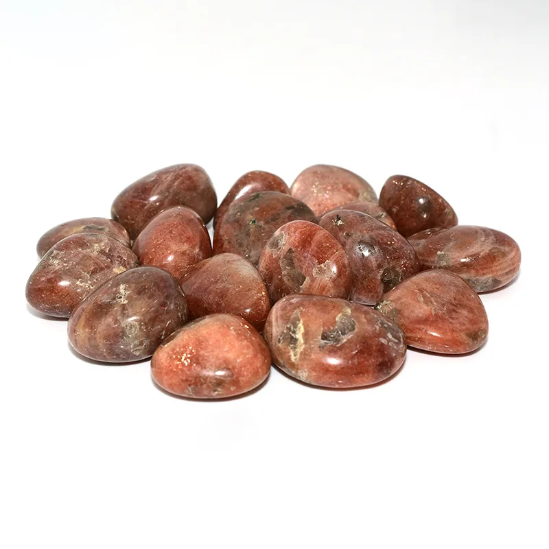 Golden Sunstone Tumbled Stone Wholesale – mixed polished stones in 20–30mm sizes on a white background