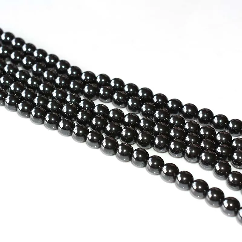 Hematite Beads Wholesale – 6mm glossy round beads arranged in parallel strands