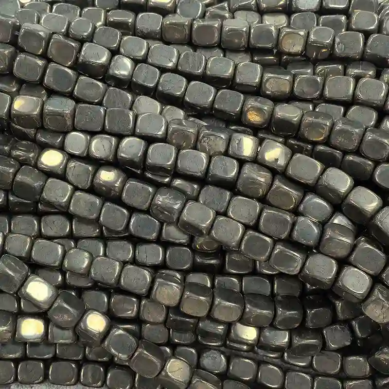 8x10mm Pyrite Beads Wholesale – close-up of rounded freeform beads showing varied metallic tones