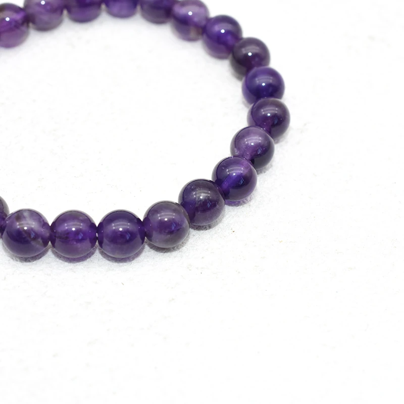 Amethyst Bracelet Wholesale close-up showing purple beads and visible stone textures