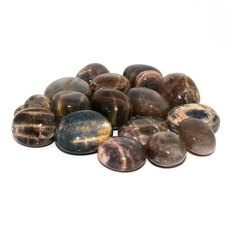 Black Sunstone Tumbled Stone Wholesale – group of tumbled stones with visible internal flashes