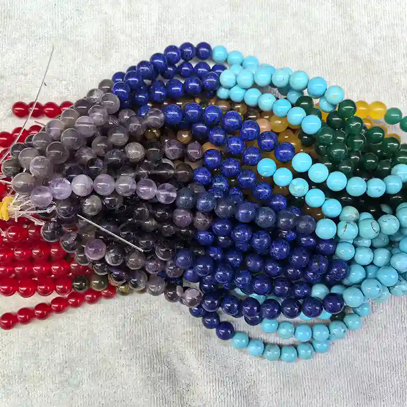 Chakra Beads Wholesale – top view of overlapping seven-color bead strands