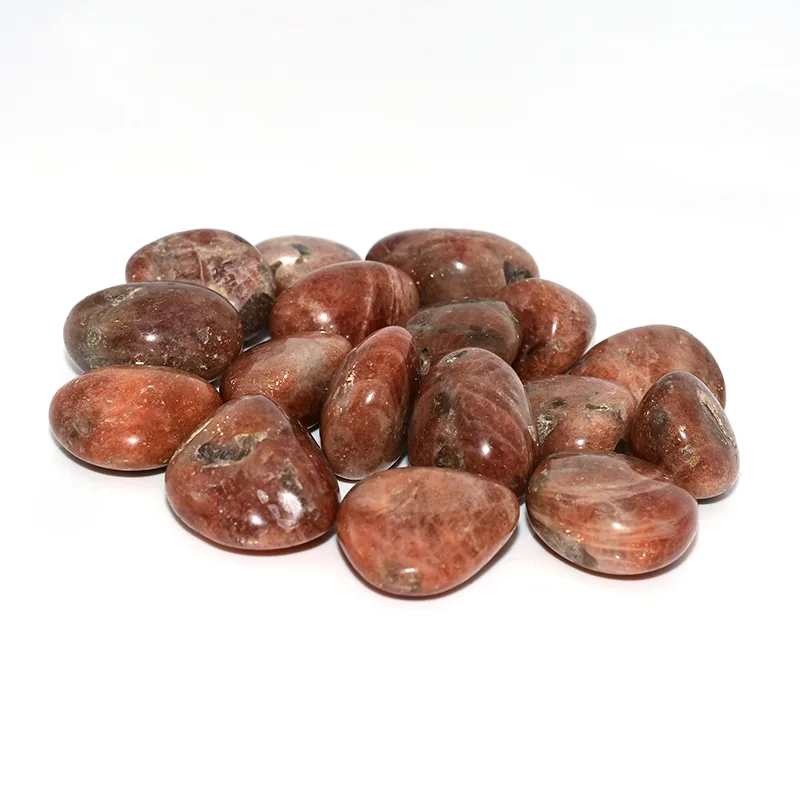 Golden Sunstone Tumbled Stone Wholesale – close-up of reddish-brown stones with golden specks