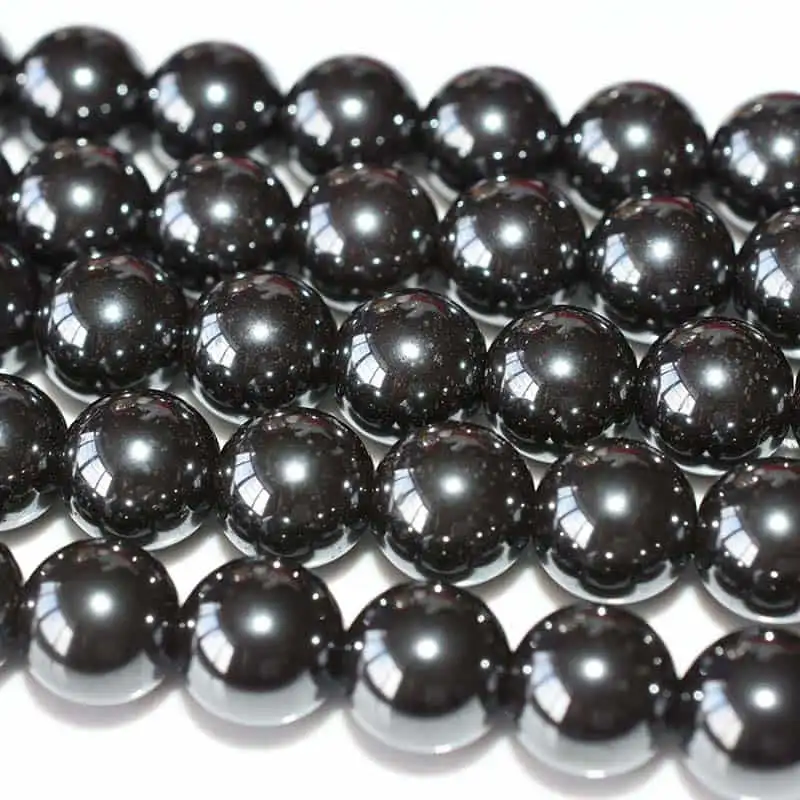 Hematite Beads Wholesale – close-up of glossy round beads showing their surface finish