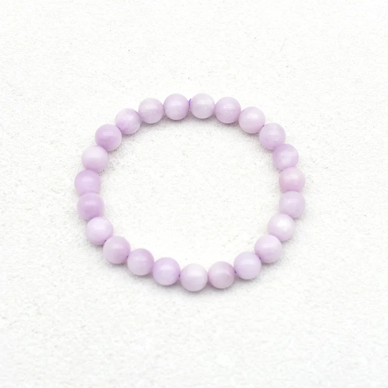 Kunzite Bracelet Wholesale top view showing pale purple round beads arranged in a circle
