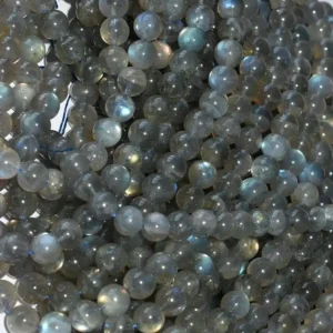 Labradorite Beads Wholesale – multiple strands of round gray beads showing blue reflections