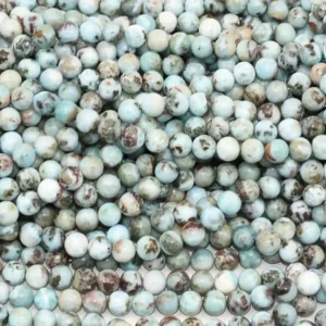 Larimar Beads Wholesale – multiple round bead strands showing varied colors and patterns