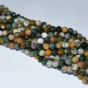 Ocean Jasper Beads Wholesale – green, brown and cream bead strands arranged diagonally on a white background